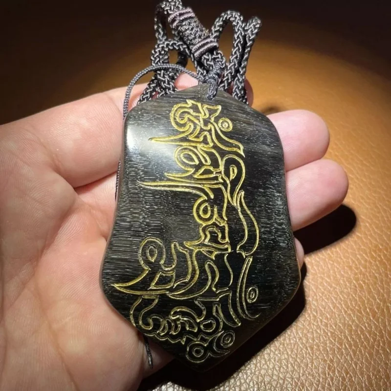 Hand-carved black donkey hoof pendant, a premium 