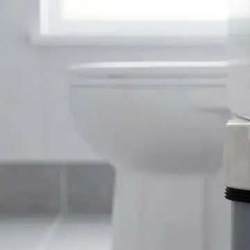 Siphon Displacement Drain Pipe Connector for Toilets Supporting Extended Reach in Shallow and Deep Recess Applications