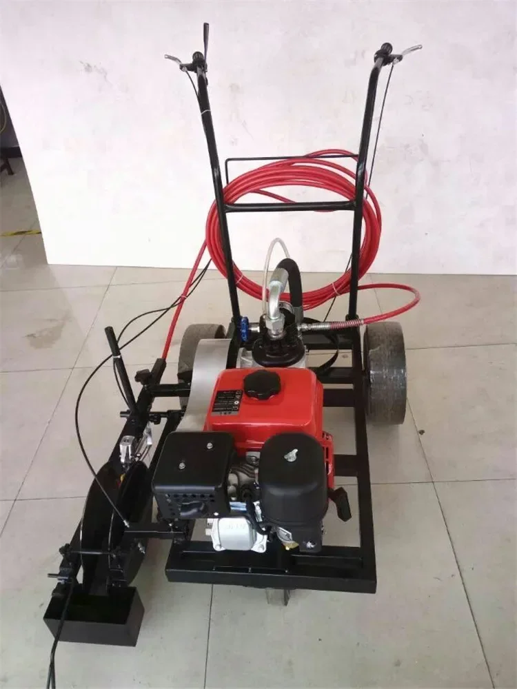 Plastic marking machine for sports field tracks