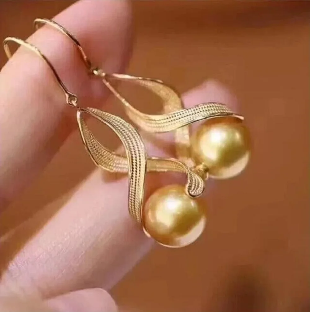 

Gorgeous and exquisite pearl earrings AAA9-10mm 10-11mm round natural South Sea gold pearl earrings 925S