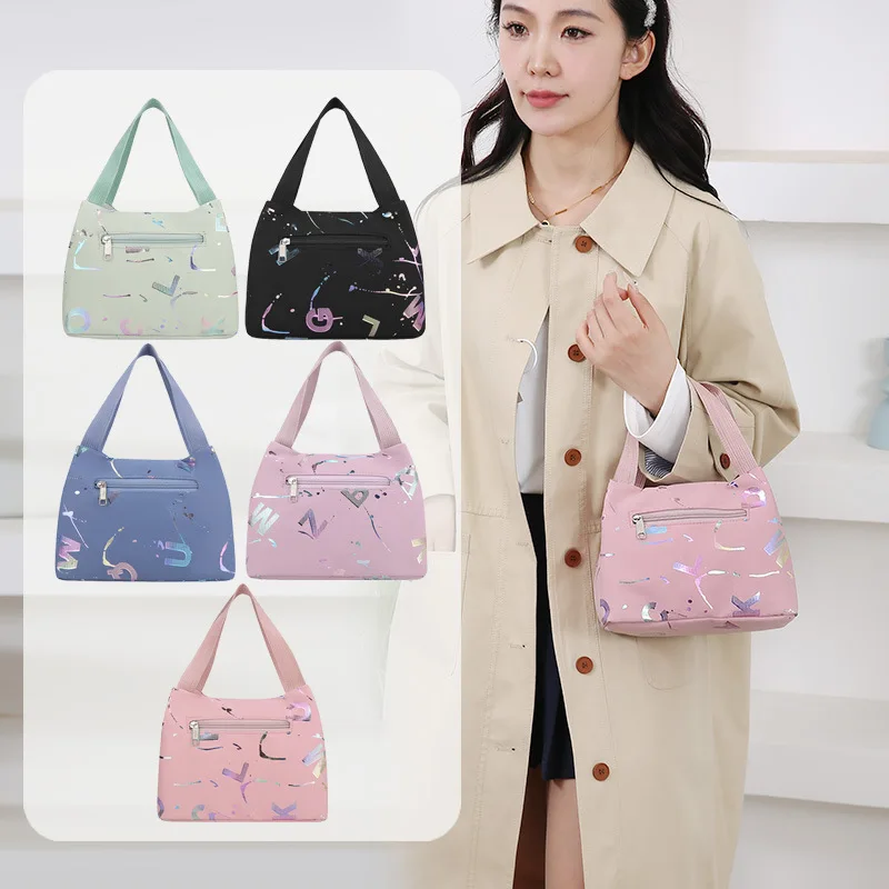 حقيبة غداء عصرية جديدة لعام 2026 جوكر أكسفورد حقيبة يد مقاومة للماء حقيبة يد صغيرة من القماش حقيبة مستحضرات التجميل المحافظ وحقائب اليد