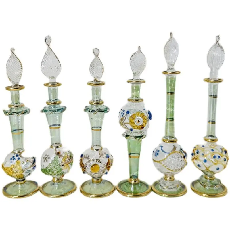 

Egyptian Handmade Perfume Bottle with Egyptian Essence External Carved Version 10-12 Cm