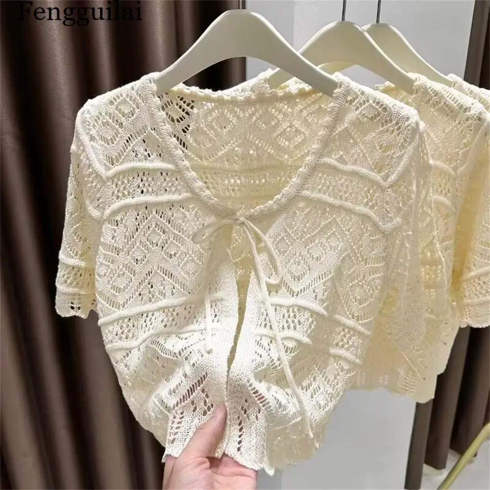 2026 New Lace-up Knitted Short-sleeve Cardigan Women's Summer Air-conditioned Outdoor Shawl Hollow Sunscreen Top Female Shrug