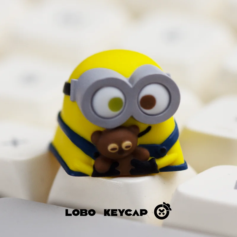 2024 nuevos Minions Bob tema único periférico de animé lindo diseño de personalidad arte de resina teclas de teclado mecánico regalo de cumpleaños