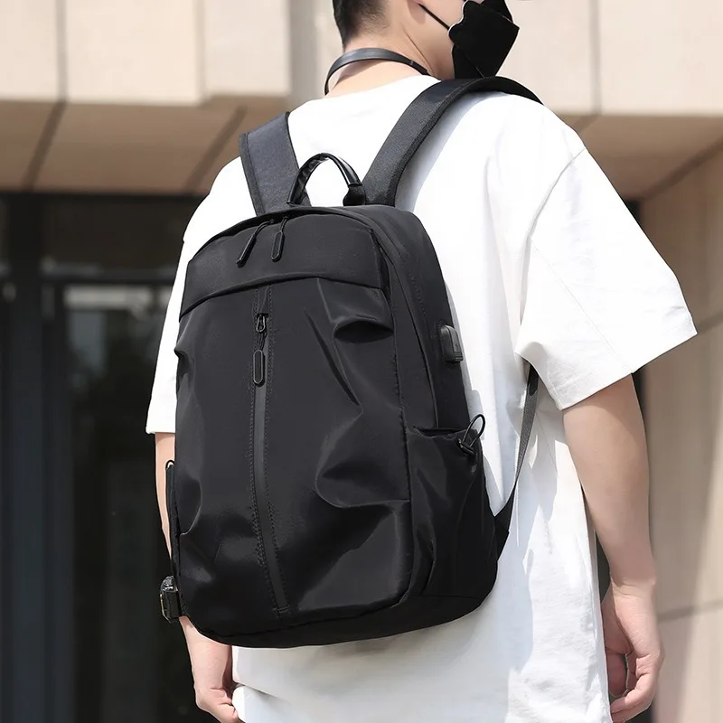 

Minimalist Black Backpack For Unisex Durable Casual Rucksack With USB Port & Laptop Sleeve Detail