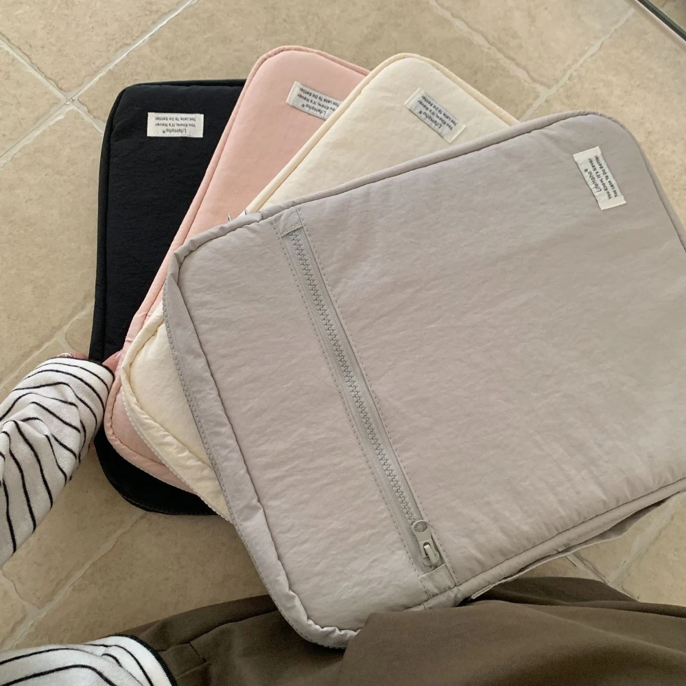 

The new laptop bag is suitable for iPad 10-inch 11-inch tablet bag 13-inch 14-inch liner bag.