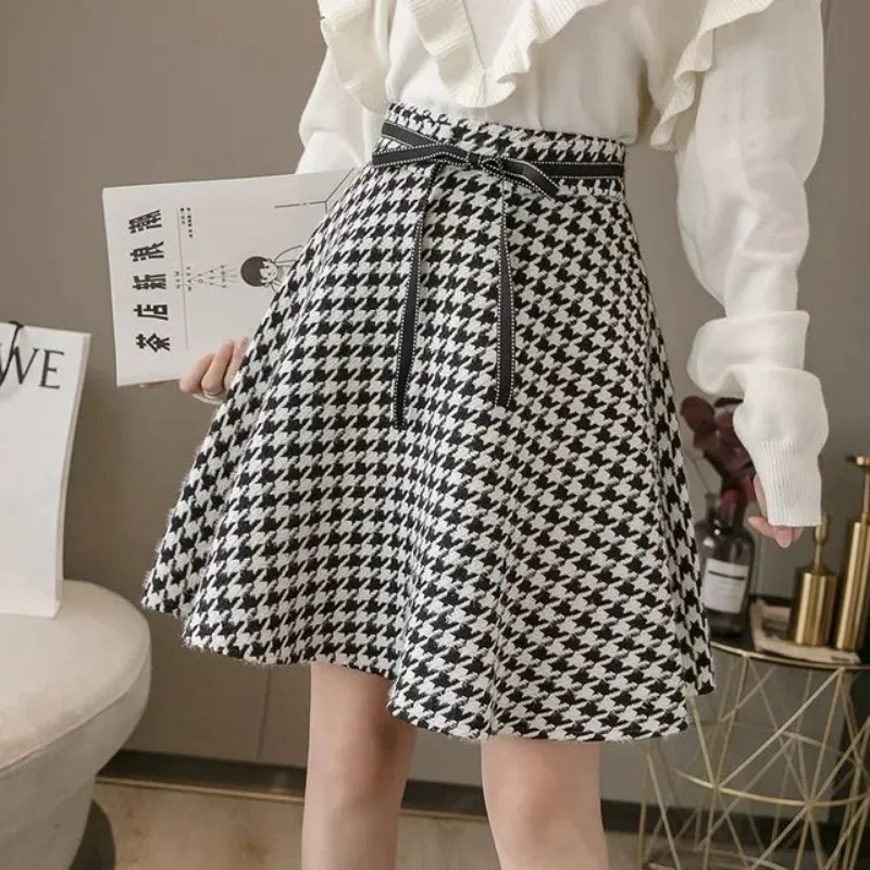 New Fashion Houndstooth Autumn Skirt Women Small Fragrance High End Elegant Design Sense Lace Up Bow A-line Pleated Skirts Jupe