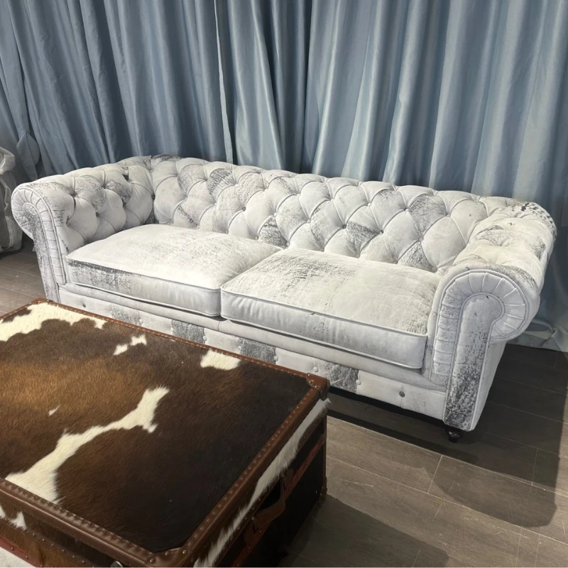 New light luxury buckle straight row full cowhide sofa leather art