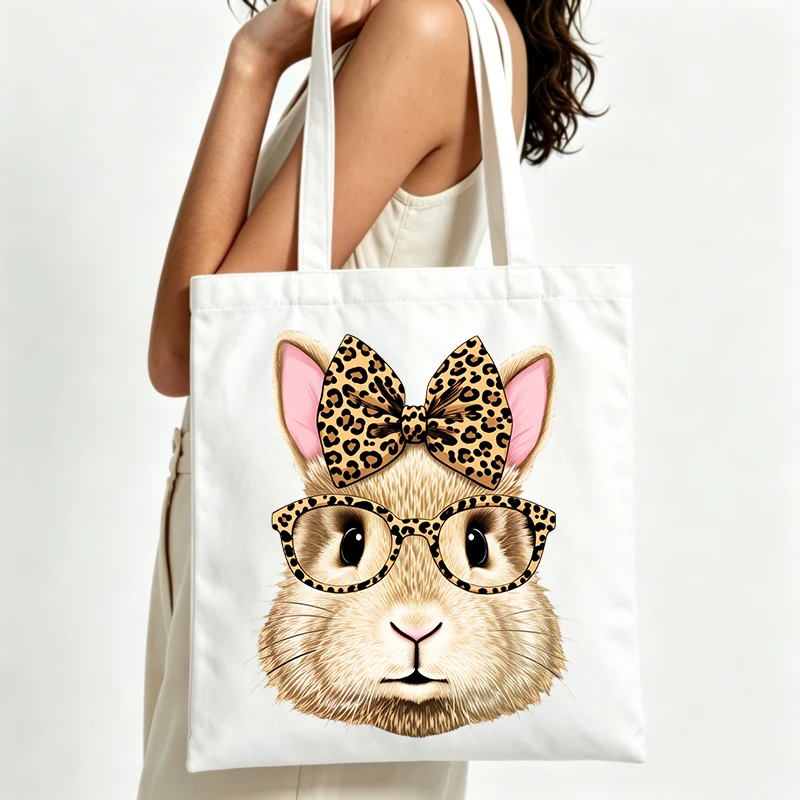 cute rabbit graphic canvas tote bag with leopard print accessories, perfect for casual daily use and shopping outings