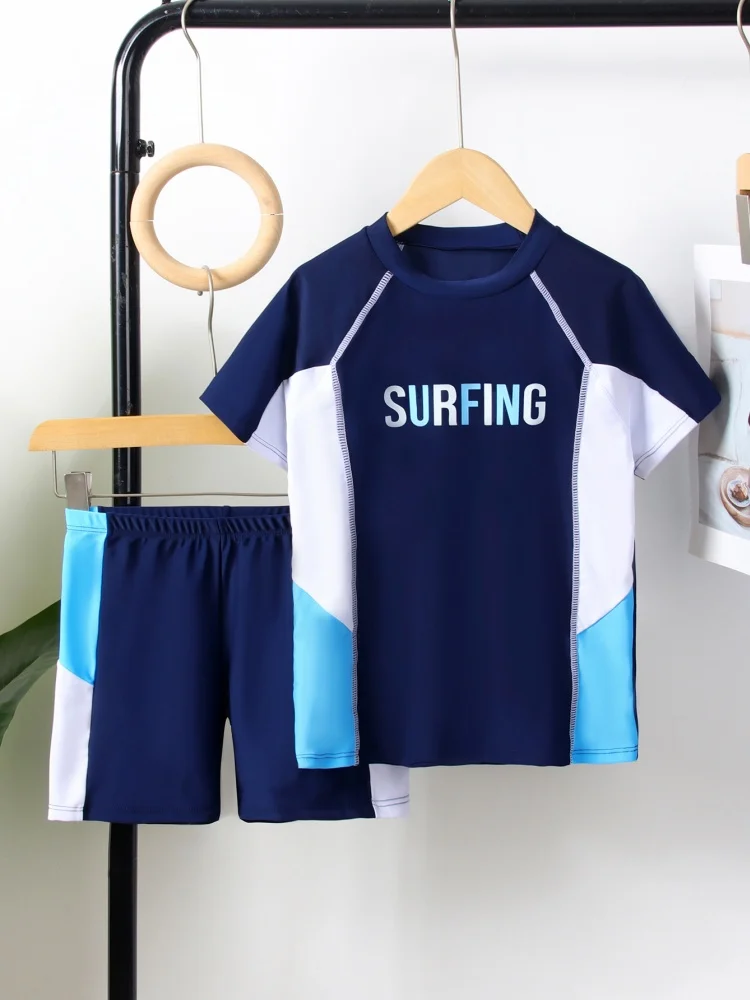

Two Piece Boy Kids Swimsuit 2025 New Solid Sports Short Sleeve Children Swimwear Summer Shorts Beachwear Bathing Suit Swimming
