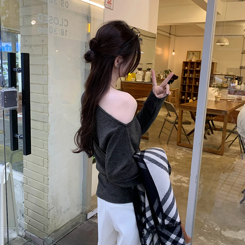 T-shirt da donna bianche con scollo a barchetta primavera estate 2025 Nuova manica lunga coreana divisa casual fondo allentato top in maglia Tee femminile