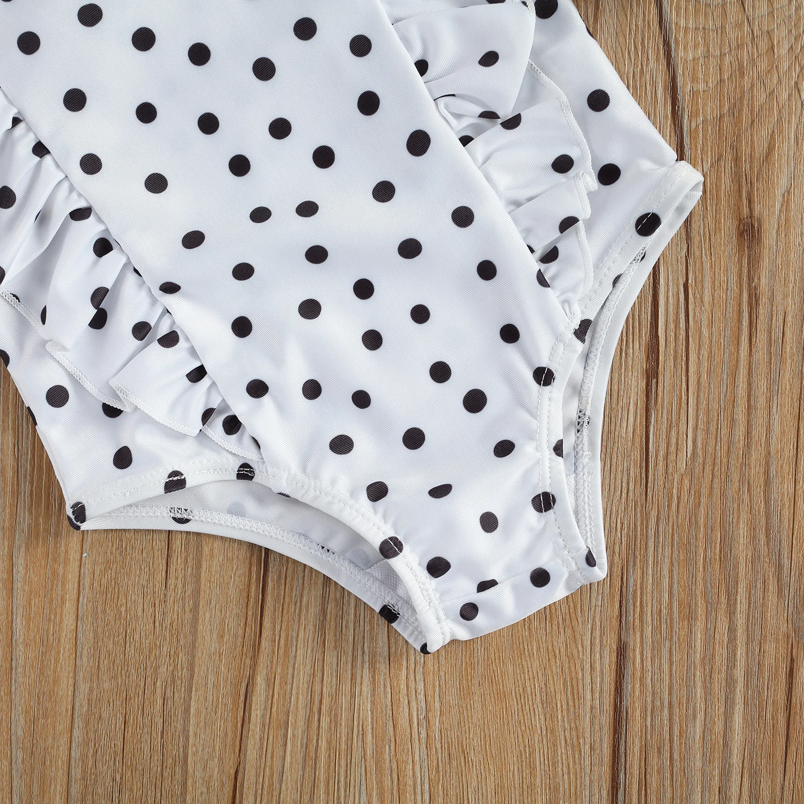 Bañador sin mangas con estampado de lunares para niños y niñas, traje de baño informal con lunares en blanco y negro, ropa de playa, 2024