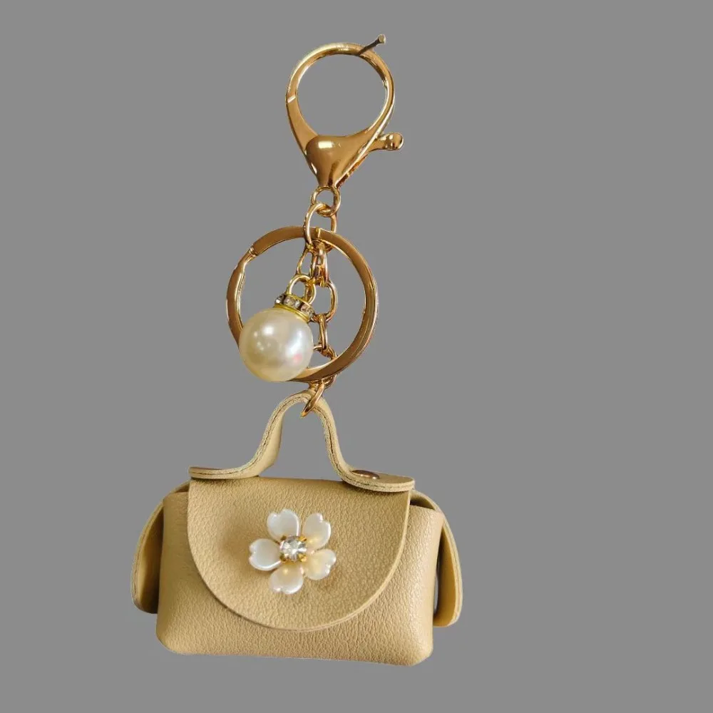 

Cute Flowers Mini Storage Bag Keychain Fashion Luxury Bag Decoration Coin Purse Headset Bag Protective Cover Bag Accessories