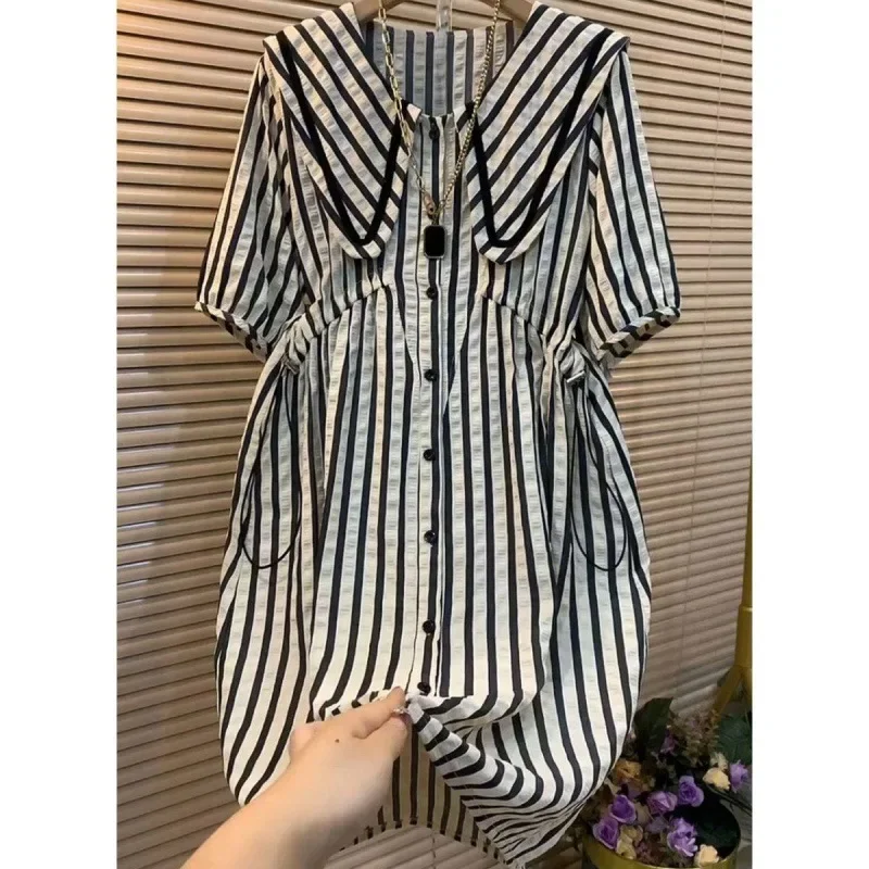 Striped dress female summer 2024 new fashion plus size loose slim temperament design elegant navy collar casual Joker skirt.