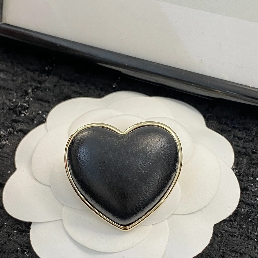 

European and American personality black gold leather love brooch