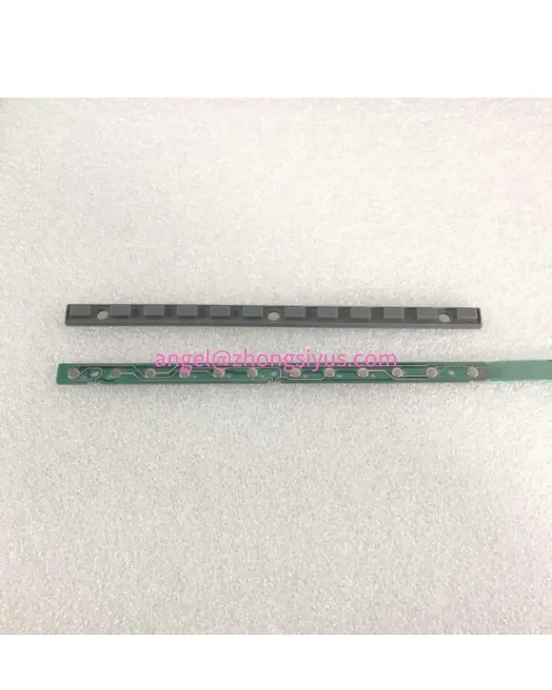 A new set of Series 21i-T console button strips