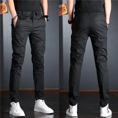 

Мужские облегающие брюки с эластичной резинкой на талии, черные повседневные брюки в корейском стиле, модные для универсальных нарядов