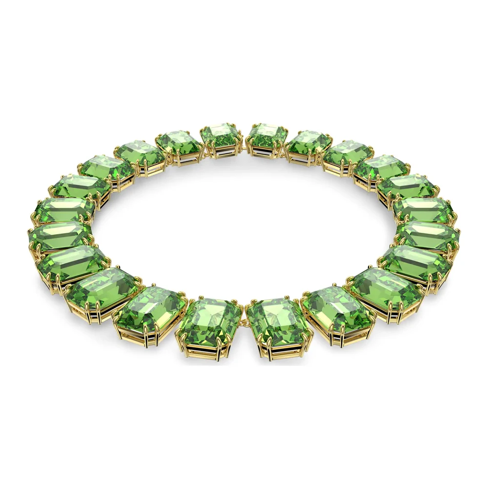 

Золотистое колье-чокер с зелеными кристаллами изумрудной огранки