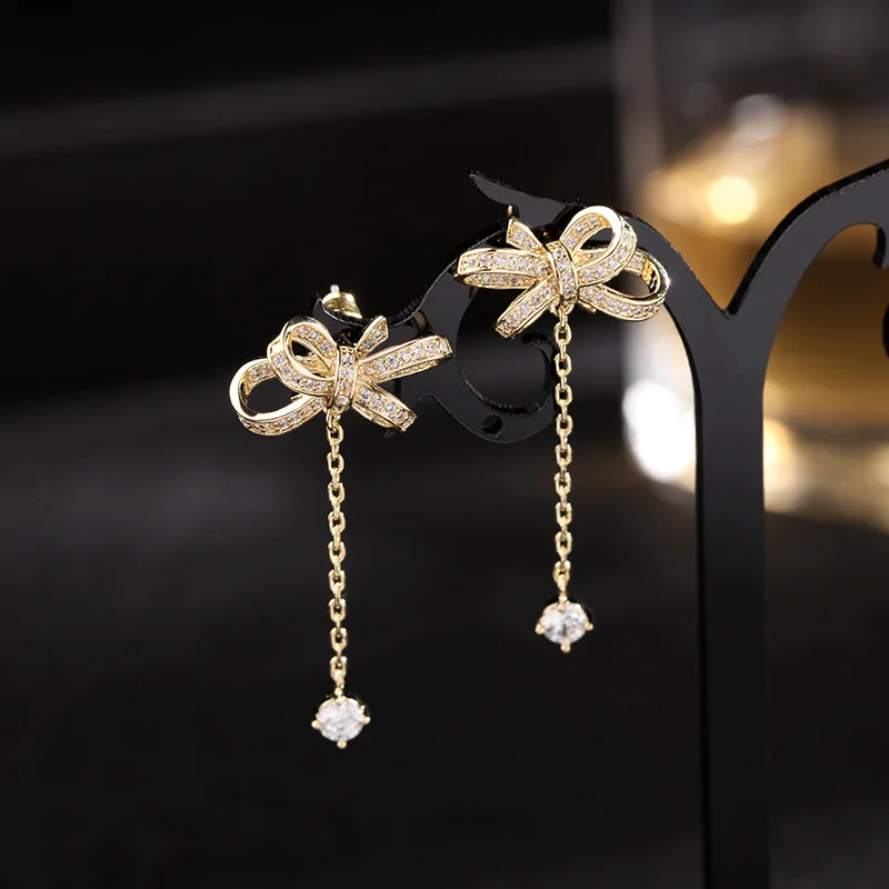 

Bow, super fashionable stud earrings, female Internet celebrity zirconium-set earrings, Japanese and Korean silver needles
