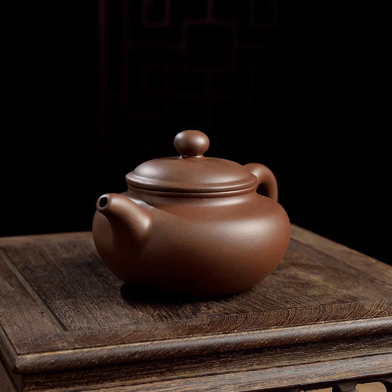 

Yixing Purple Clay Pot with Stainless Steel Tea Filter Kung Fu Tea Set Antique Pot 250ML