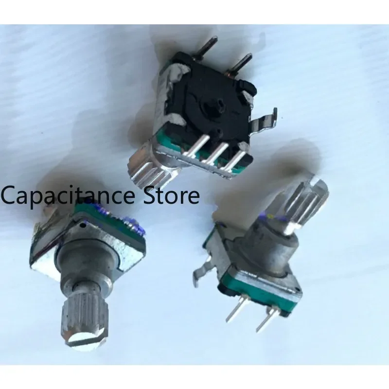 5PCS EC11 encoder with push switch 18 positioning 9 pulse axis length 13MM.