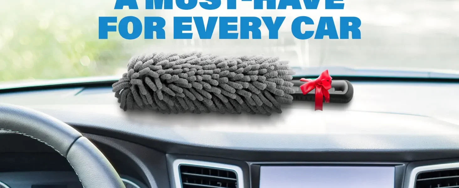 Compact gray dash duster placed on car dashboard, perfect for daily interior cleaning