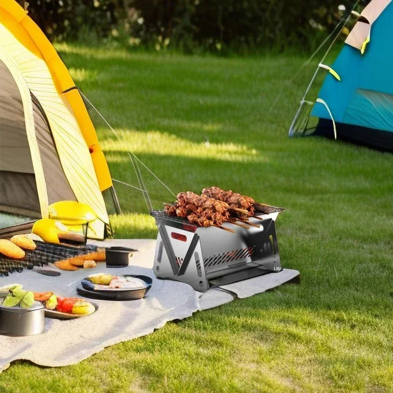 موقد مخيم لحرق الأخشاب للنزهة في الهواء الطلق ، طباخ شواء ، صلب مقاوم للصدأ ، موقد حقيبة ظهر قابل للطي مع شبكة شواء ، موقد حريق للنار