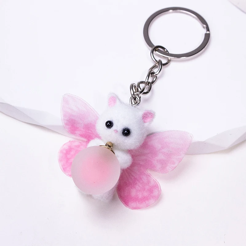 LLavero de gato flocado para mujer, colgante de gato con alas de mariposa Rosa dulce, mochilas, dijes de coche, accesorios de llavero de animales