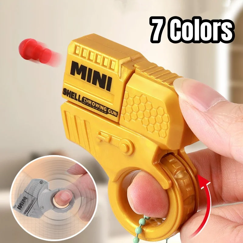 7 kolorów Fidget Toy Mini Shell Wyrzucanie pistoletu zabawkowego Antystresowy pierścień ręczny Pistolet Prezent urodzinowy Gra Palec Stress Relief