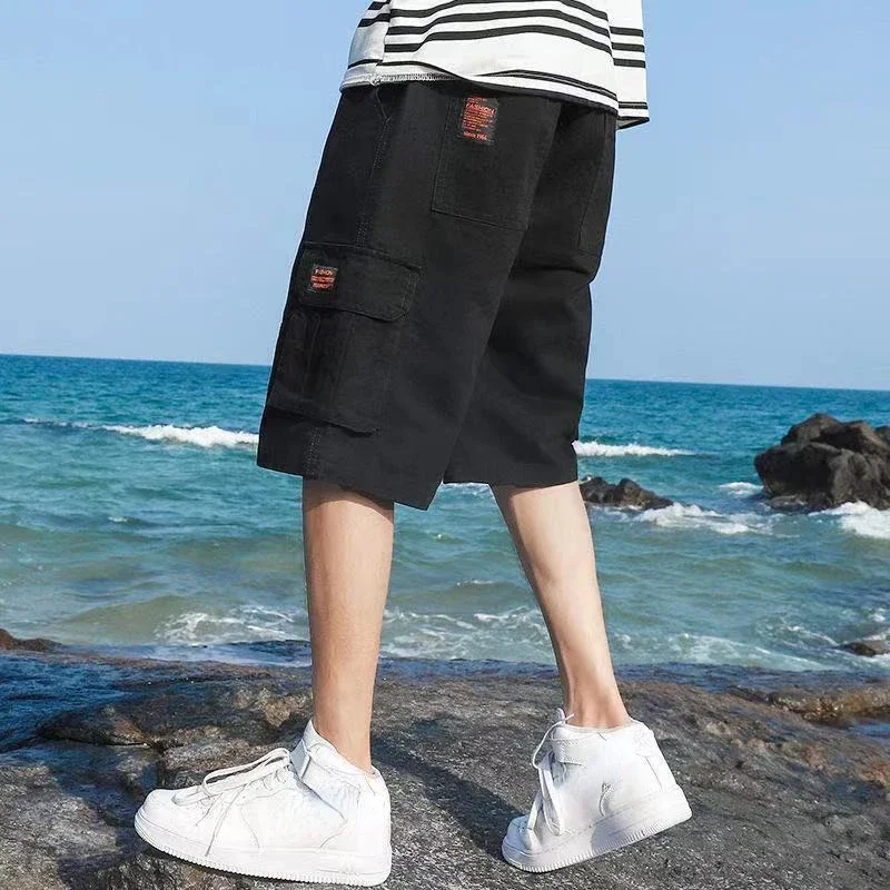 Pantalones cortos Cargo para hombre, Bermudas de algodón elástico, diseño cómodo, medio sólido con cuerda de dibujo