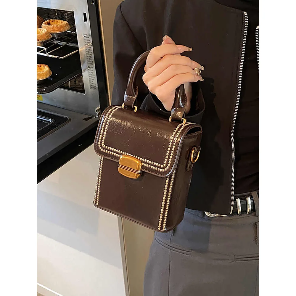 Borse retrò Scatola Borsa piccola quadrata con manico superiore per donna 2025 Borse a tracolla singole versatili casual Confezione giornaliera a tracolla per pendolari