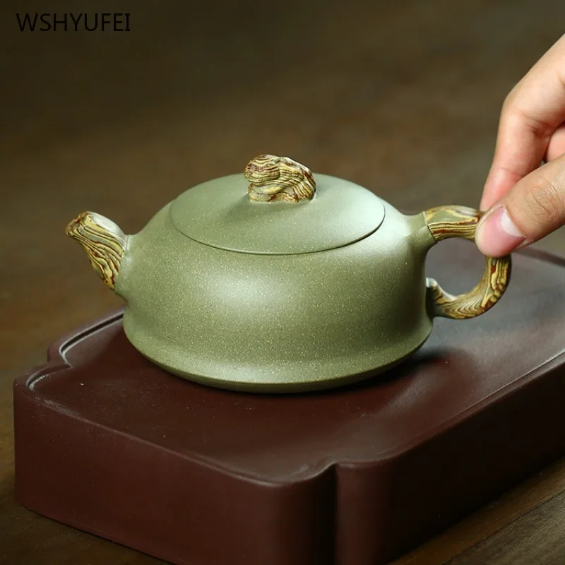 

Yixing dark-red enameled pottery teapot Pure handmade teapot Raw ore section mud 270ml tea pot