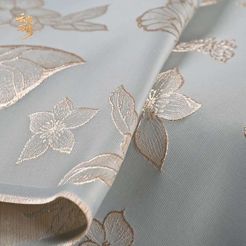 This Chinese-style blue gold thread embossed embroidered jacquard fabric can be cut into cheongsam clothing designer's