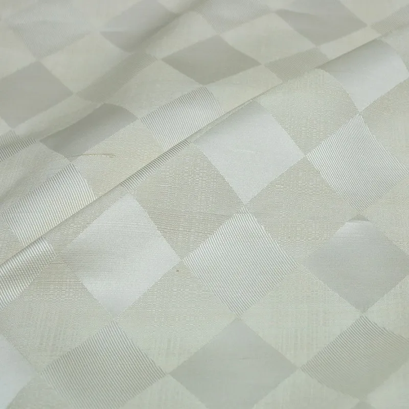 

This is a designer fabric for trend autumn and winter featuring oak silk wool diamond-shaped checkered jacquard satin