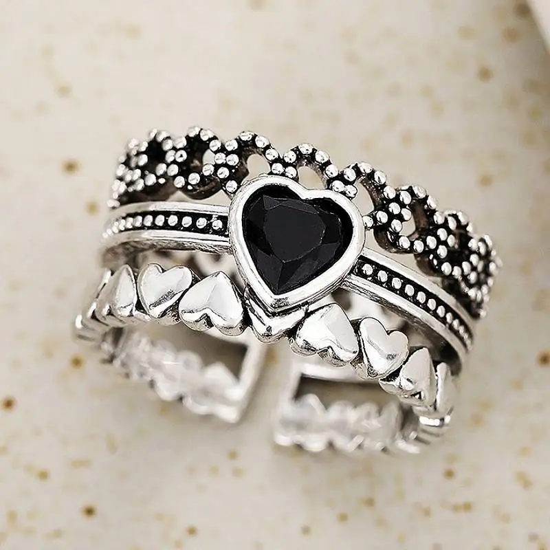 Huitan Schwarzer Herz-Damenring, elegant, besondere Party, Alltag, Accessoires, ausgehöhltes Design, modischer Finger, anmutiger Schmuck, Geschenk