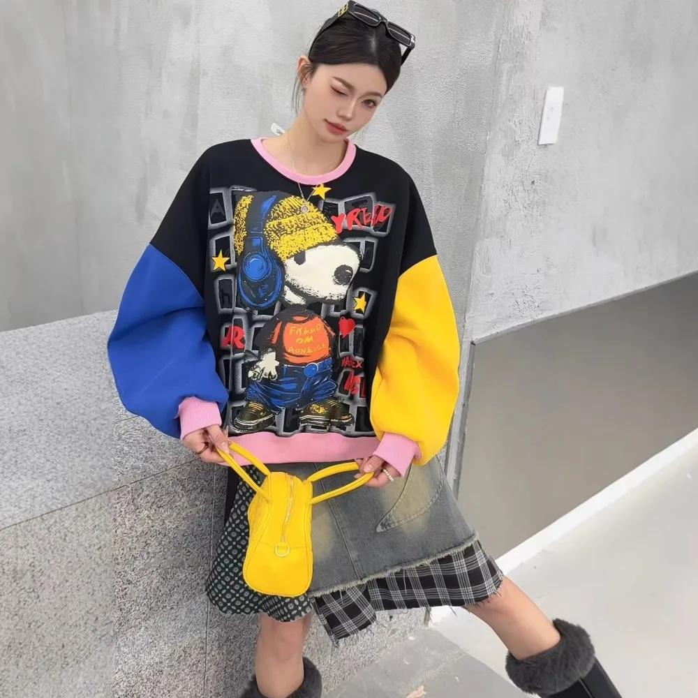 Gesplitste contrasterende trui Dames lente nieuwe schoudermouwen Leeftijdverminderende cartoon losse top met ronde hals