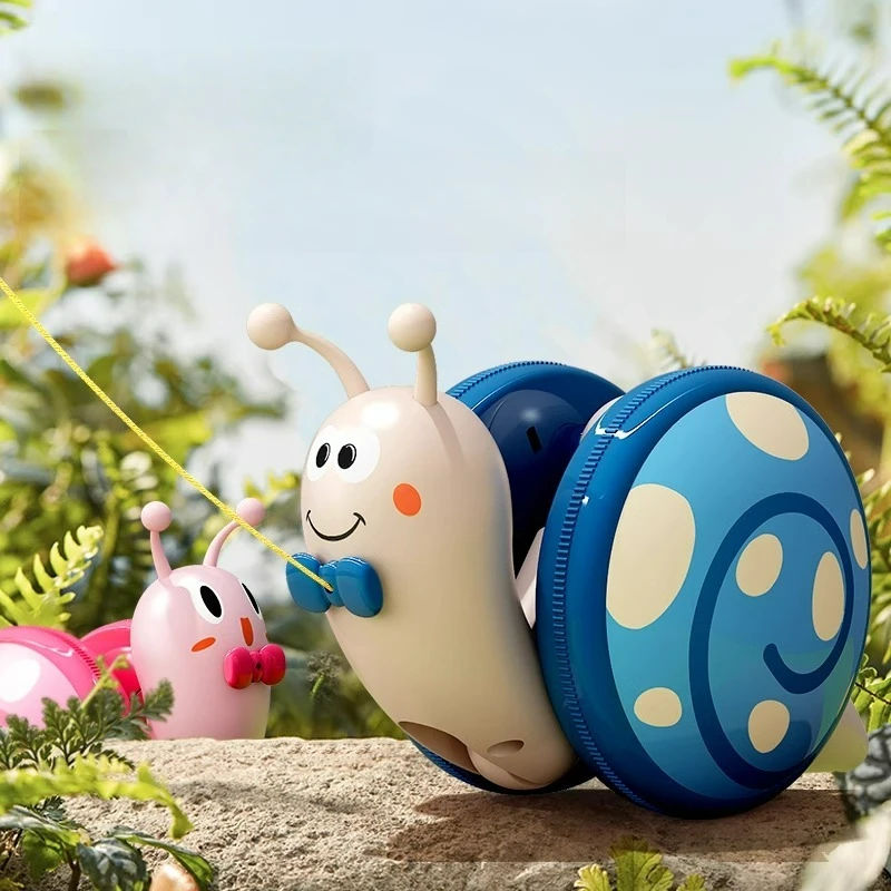 Nova corda caracol brinquedo crianças puxar corda puxando bebê rastejando aprender a andar som e luz quebra-cabeça meninos meninas brinquedo