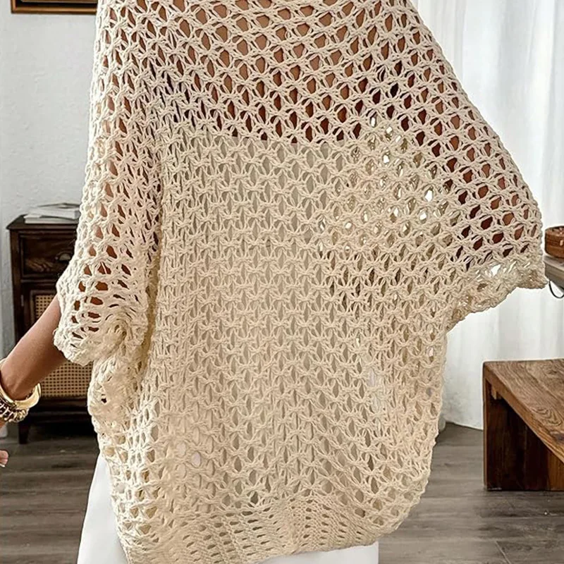 ผู้หญิงถักเสื้อกันหนาวผ้าคลุมไหล่ Hollowed OUT เสื้อกันหนาวหลวมสีทึบครึ่งแขนสั้น