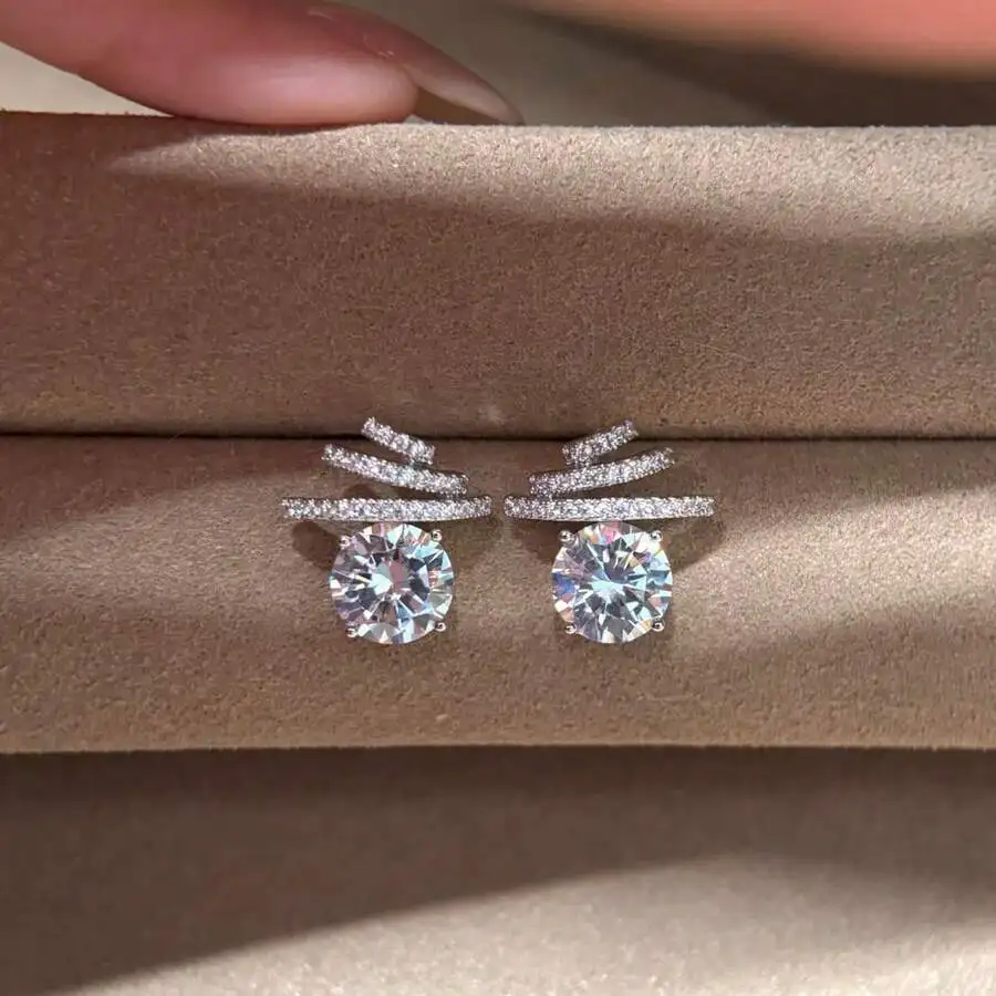 

Zirconia Stud Earrings With Triple Row Crystal Design