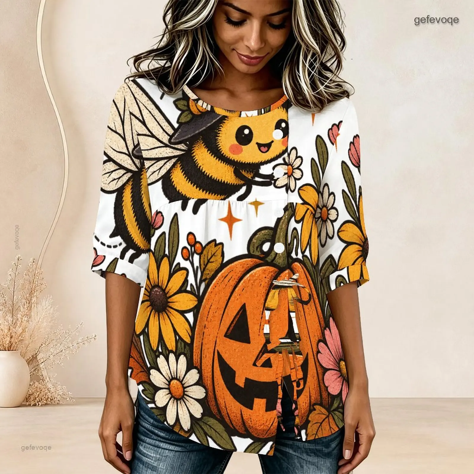 Women Round Neck Half Sleeve Gathered Front Button Detail Tie Hem Printed Blouse