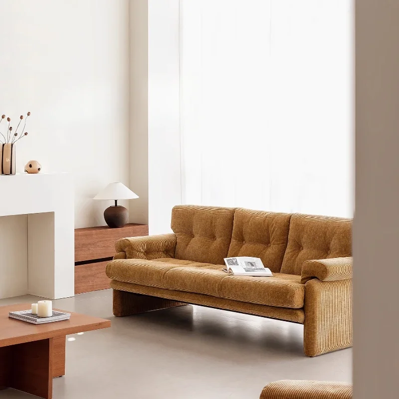 Retro straight row three-person fabric sofa