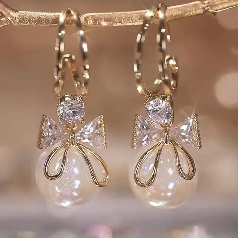 Pendientes con lazo de circonita para mujer, colgante de perlas redondas, Color dorado, forma de C, joyería elegante y delicada para fiesta, novedad