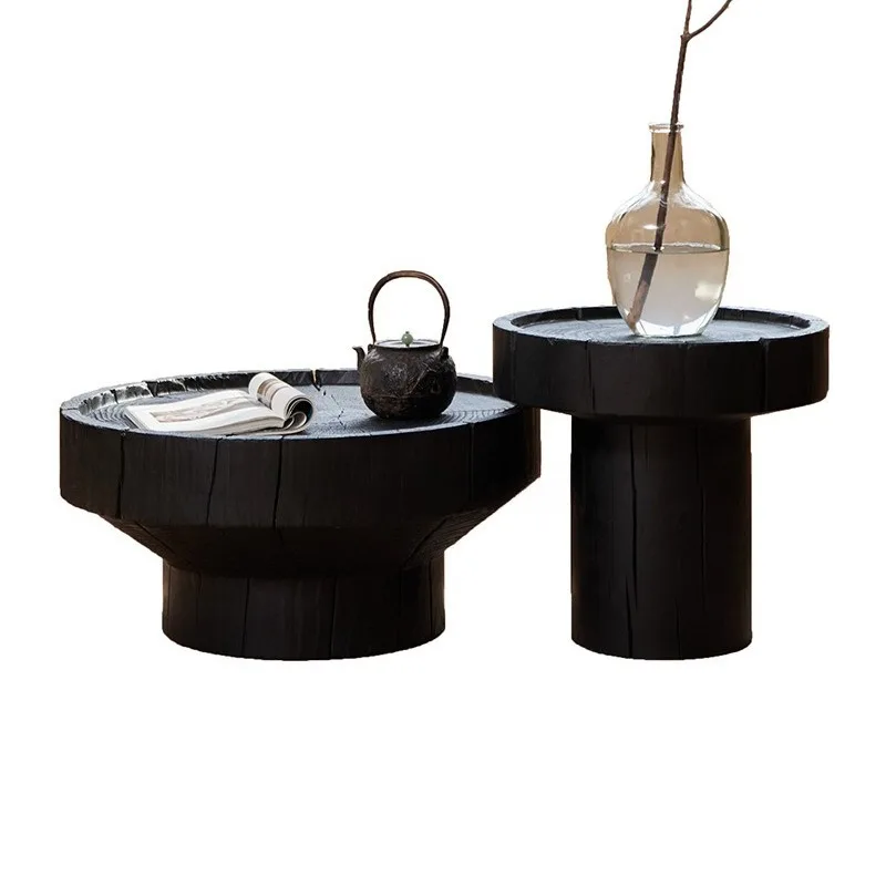 

Solid wood coffee table round carbonized black Japanese bed and breakfast coffee table Internet celebrity log pier combination