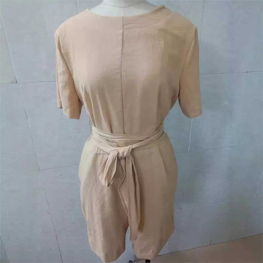 Neue kurzarm Leinen Baumwolle frauen Spitze-up Overalls Shorts Sommer Weibliche Casual Mode Tasche Einfache Strampler Hose 2025