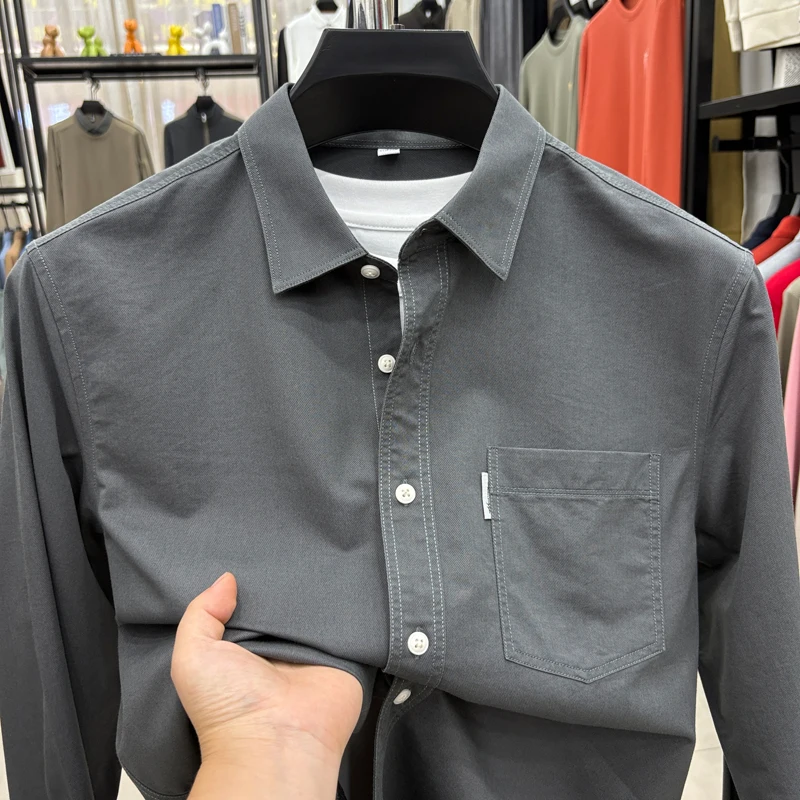 Camisa de lyocell de alta calidad de otoño para hombre, solapa de color sólido, nueva ropa de abrigo de manga larga con bolsillos, tops de moda de ocio para hombre