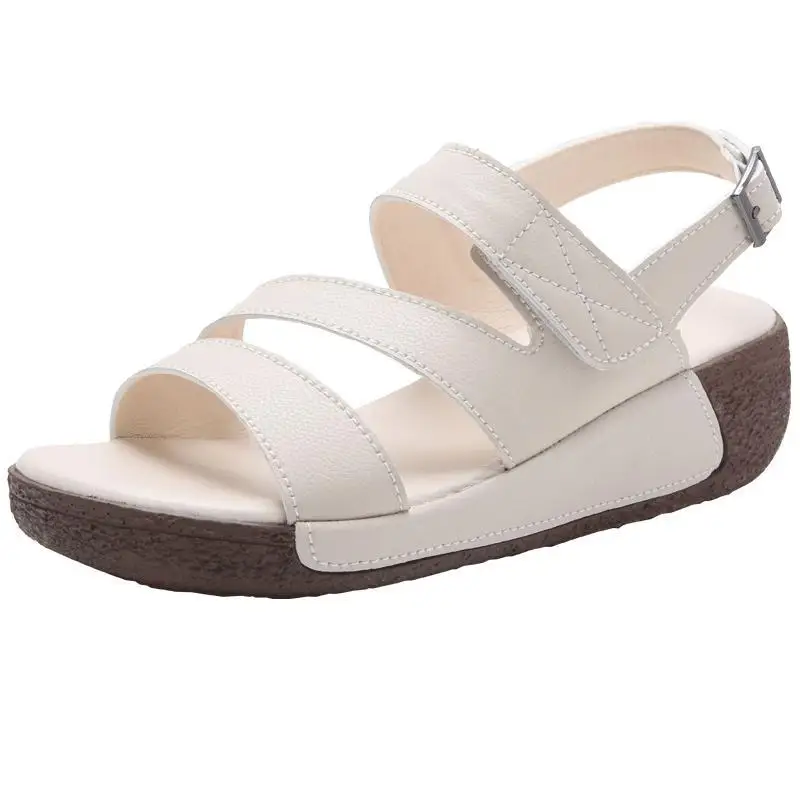 Sandalias elegantes de lujo para mujer, zapatos blancos ahuecados de cuero auténtico con agujeros, superficie suave, novedad de verano 2024