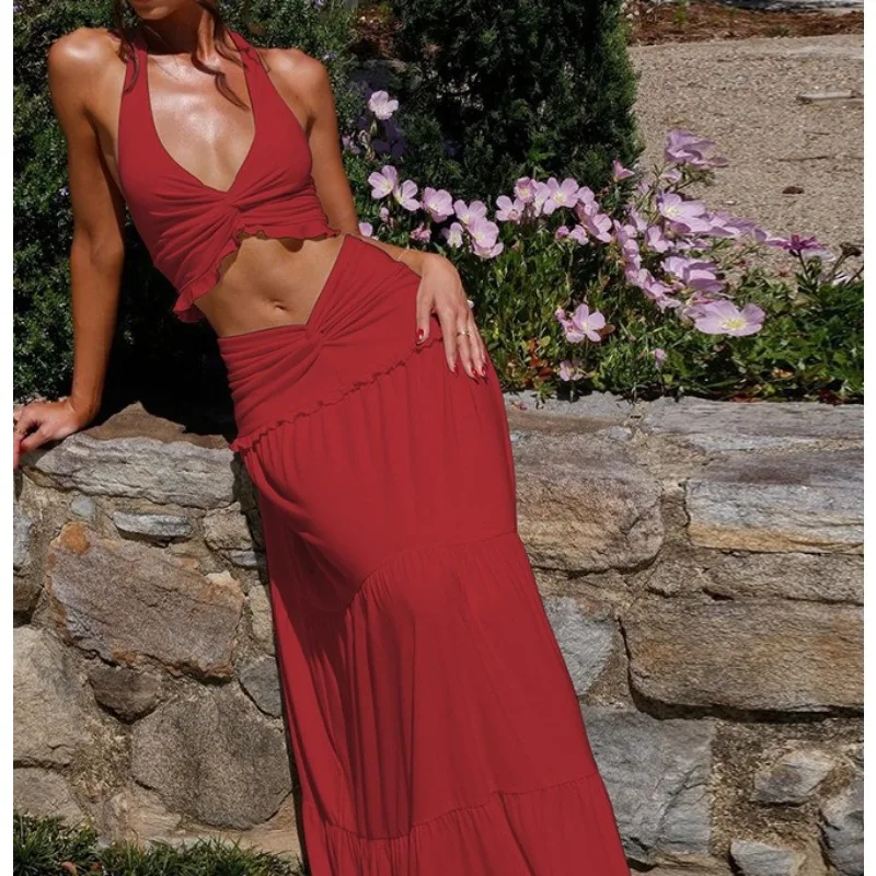 

2026 Spring and Summer New Women's Clothing Sexy Pleated Neck Suspender Top Fungus Edge Long Skirt Two-piece Set