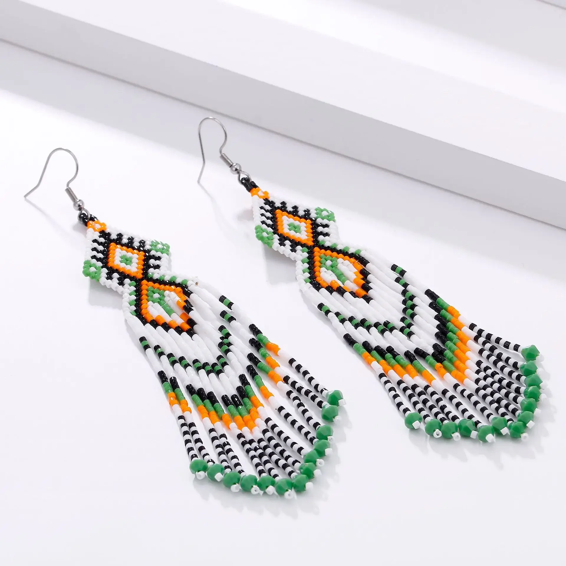 

Tassel Earrings Hand knitting Beaded Color matching diamond multi-storey Retro Bohemia alloy ma'am Rice Bead Earrings