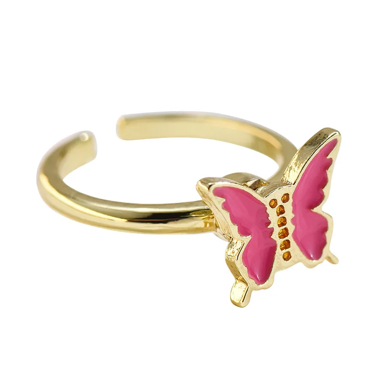 Nuovo anello aperto regolabile e anello rotante con farfalla fiore a cinque petali