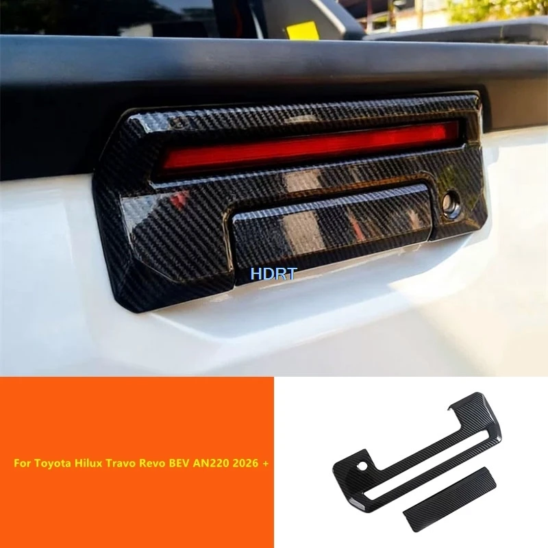 

For Toyota Hilux Travo Revo BEV AN220 2026 + Car Style Rear Trunk Door Bowl Tail Gate Handle Cover Accessories Exterior Sticker